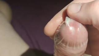 Cum and piss in a condom